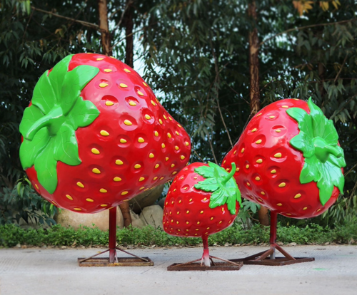giant strawberry statues