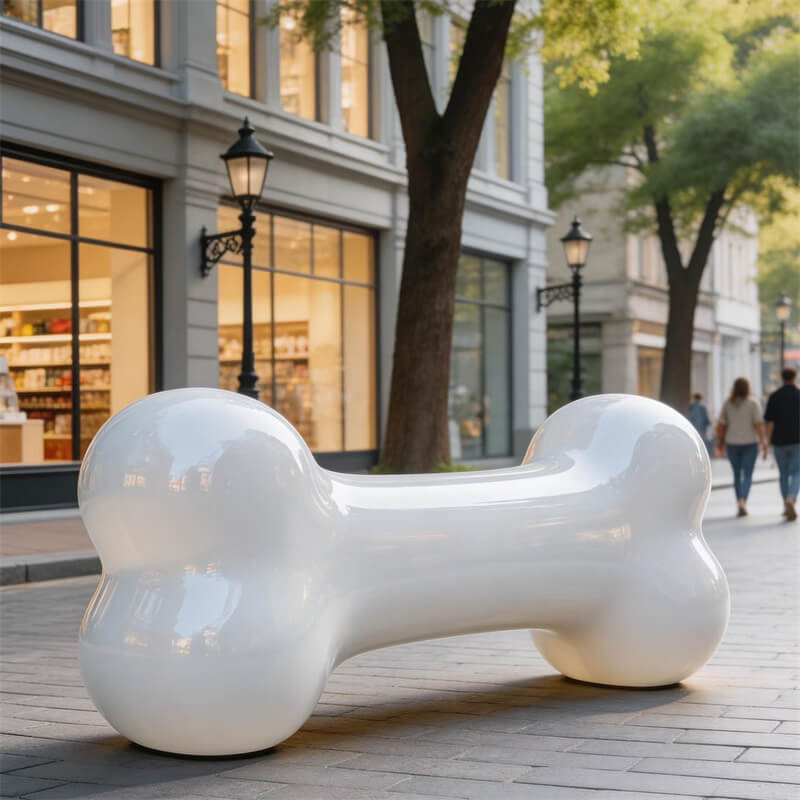 Three-quarter view of white bone FRP bench on paved street, pet-friendly fiberglass seating for mall and park
