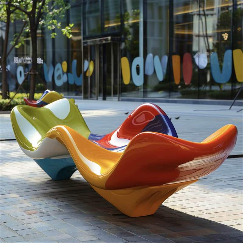 Gradient color wave fiberglass bench with artistic curves for public seating installation