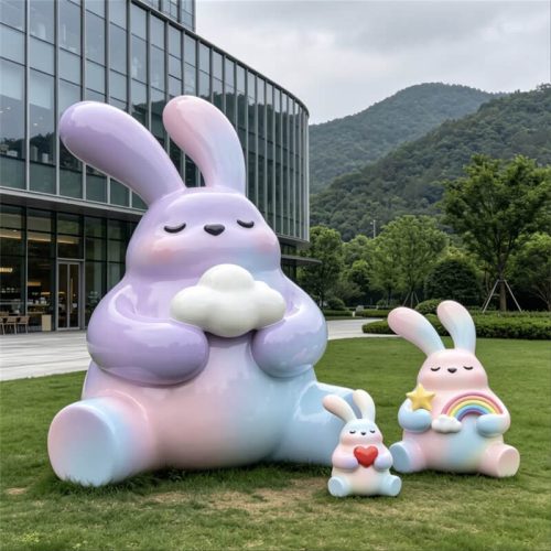 Gradient‑blend fiberglass rabbit sculpture with cloud‑heart cartoon shapes, internet‑famous parent‑child rabbit sculpture for outdoor lawns