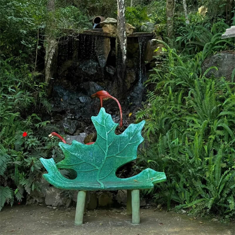 Outdoor waterfall background green maple leaf fiberglass chair park scenic leisure leaf shaped chair landscape ornament render