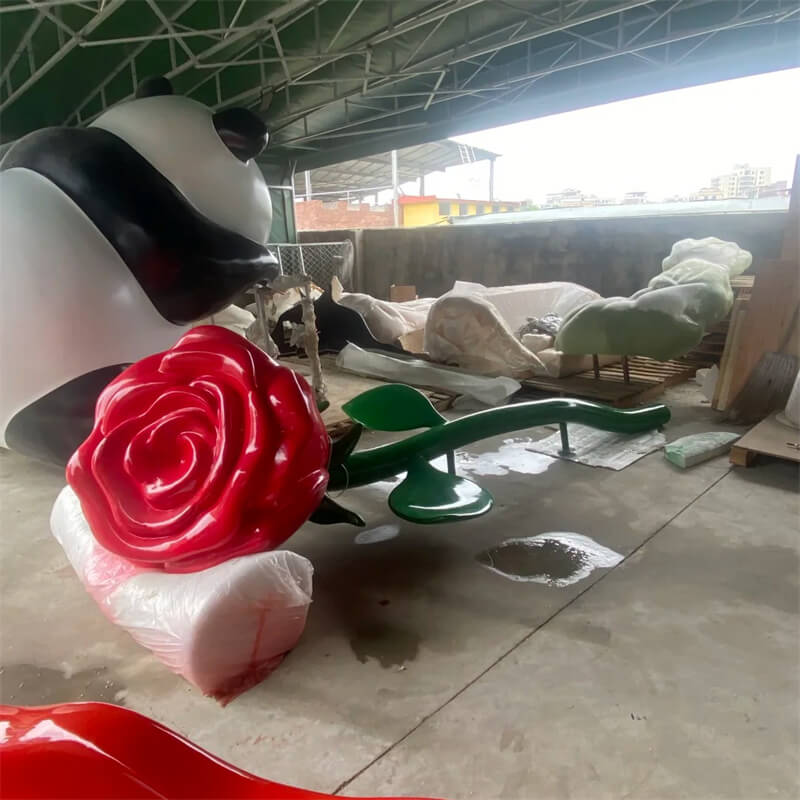 Finished giant light-up Rose Sculpture in factory, curved long stem with green leaves translucent fiberglass ornament