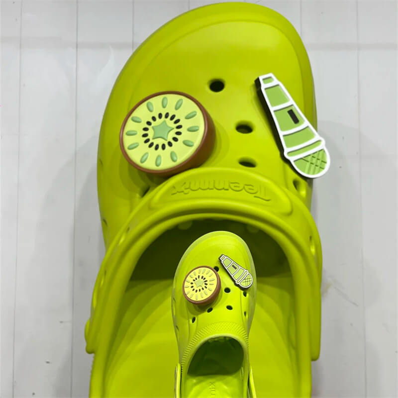 Close shot big crocs sculpture with matching mini crocs indoor window decor
