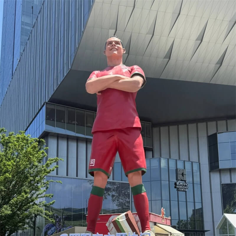 Close up of Cristiano Ronaldo FRP sculpture in mall atrium wearing Portugal jersey