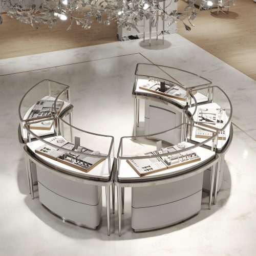 Curved jewelry showcase in mirror silver finish with leather base