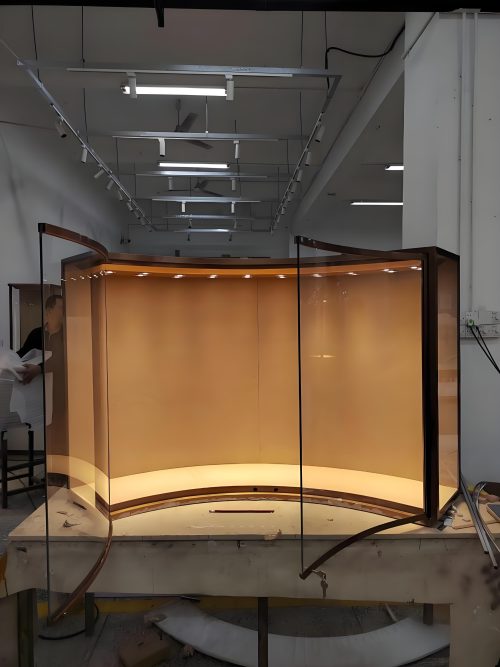 Recessed wall display case for jewelry and collectibles