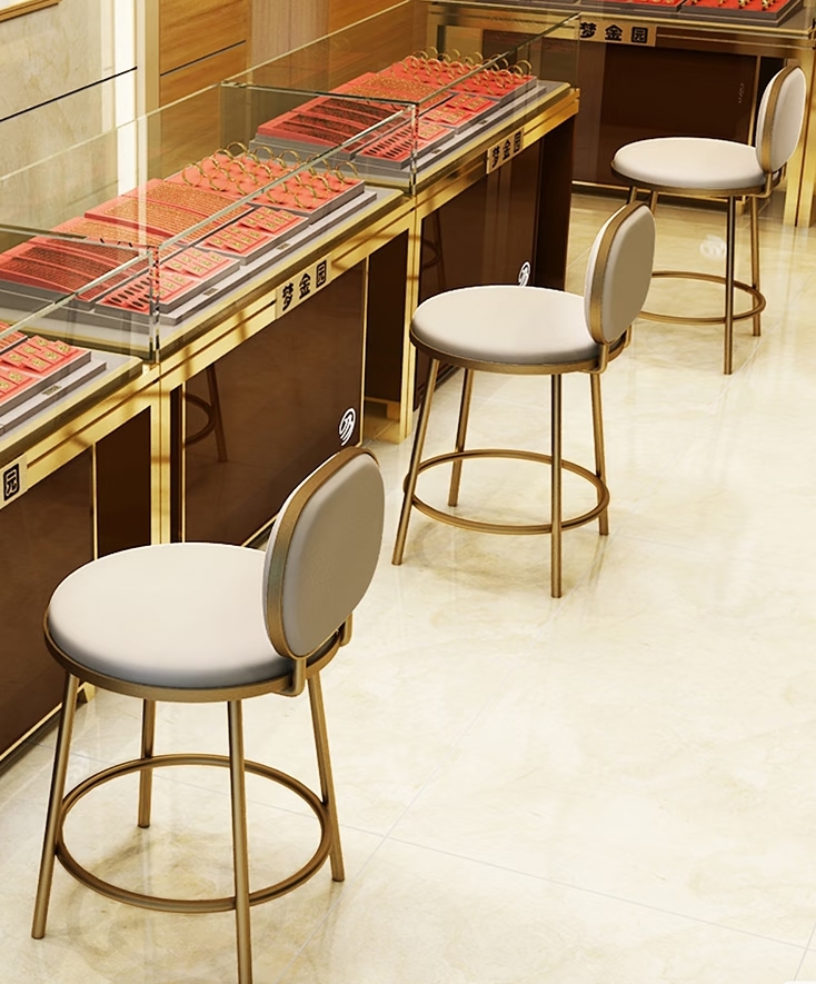 Luxury custom gold metal counter stools with padded seat and back for jewelry store display counters