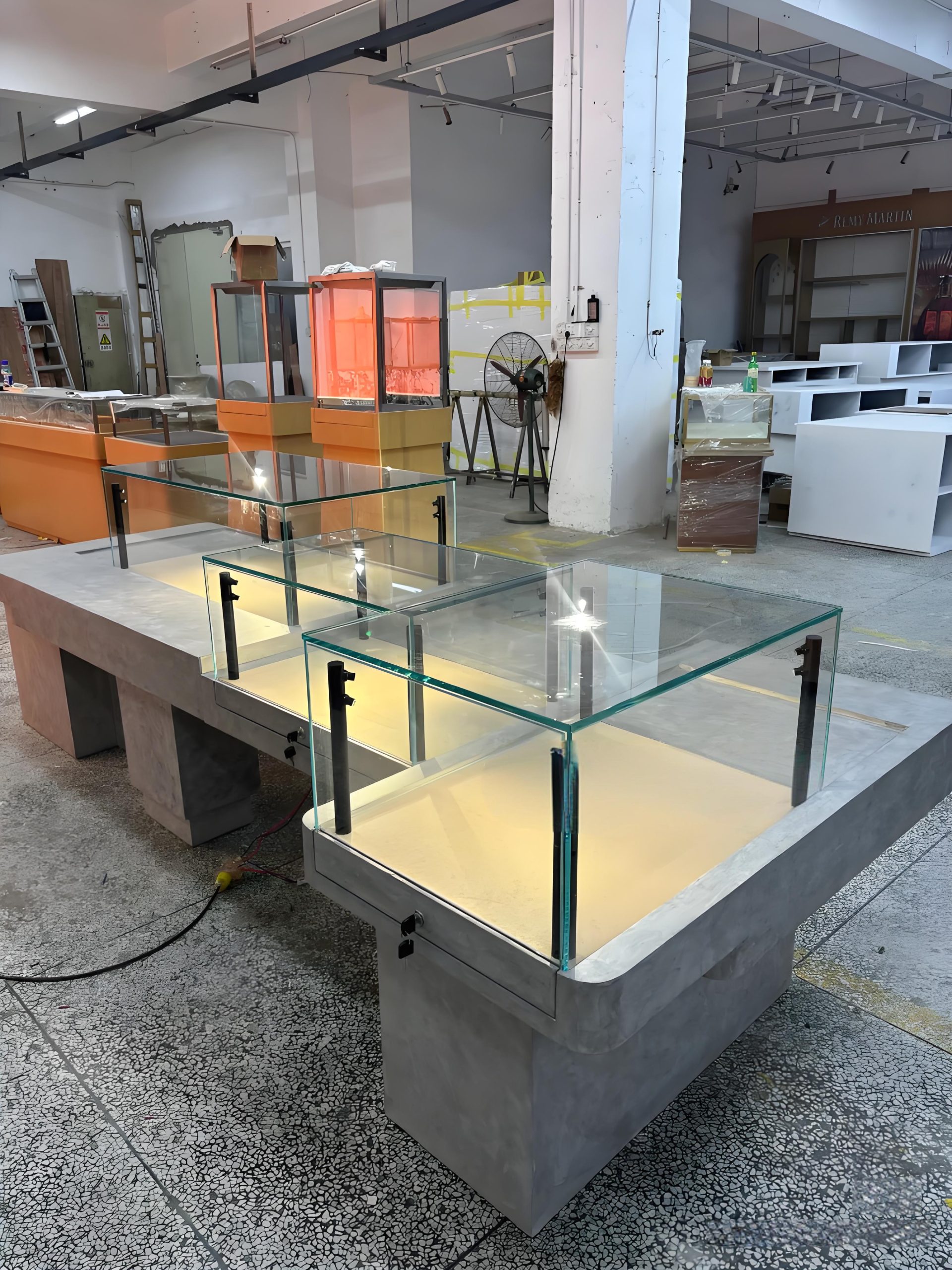 Concrete grey marble combined jewelry display cabinet, multiple separate glass vitrines with warm LED light for jewellery shop