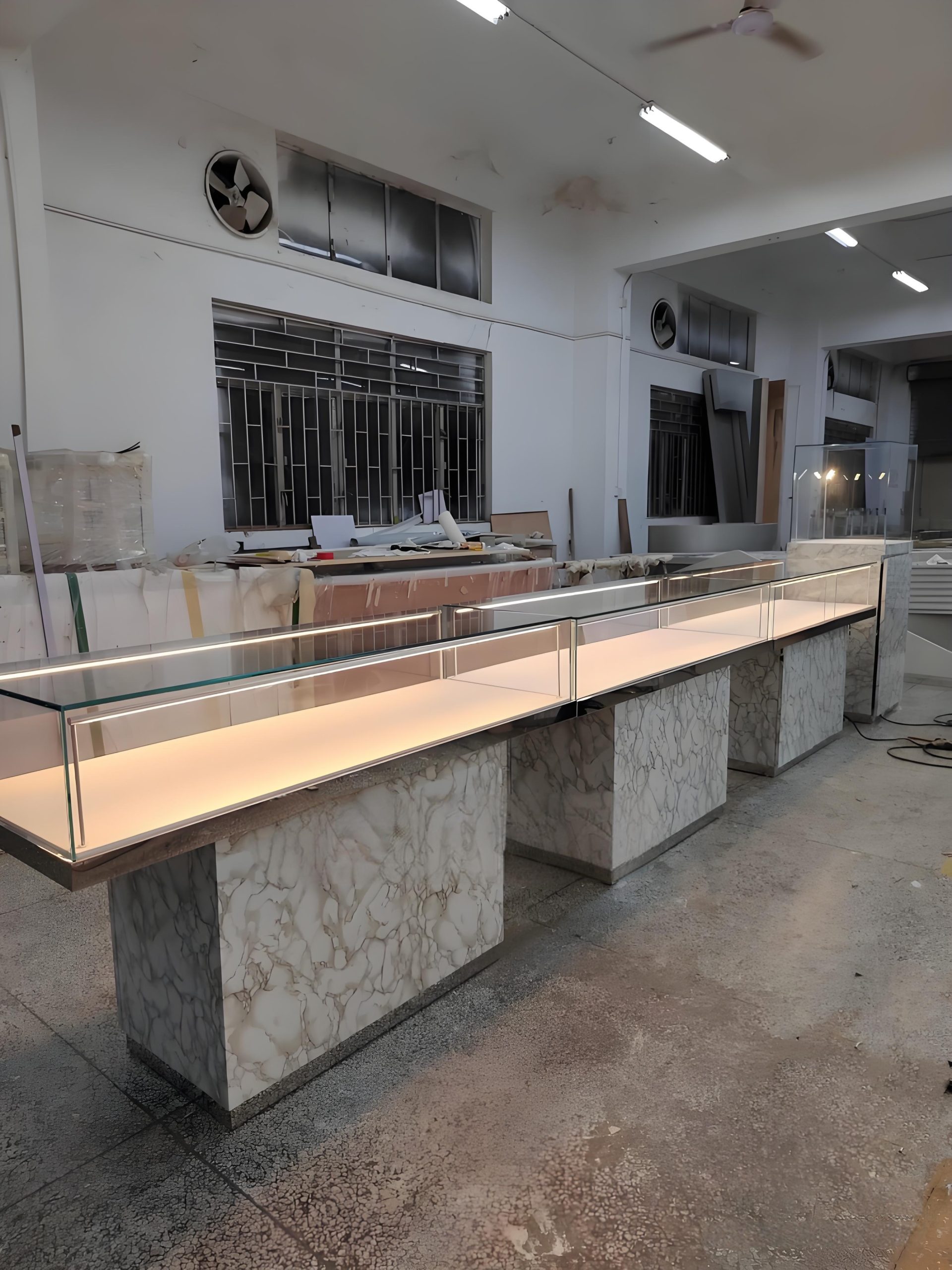 Long marble pattern base jewelry display counter, glass vitrine with warm LED light for jewellery retail store