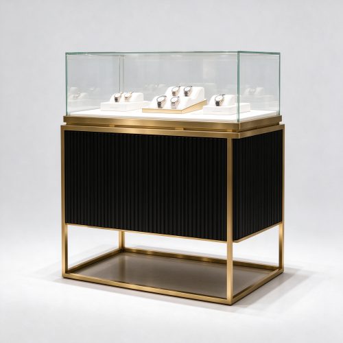Black fluted watch display counter with gold open frame, side 45 degree view