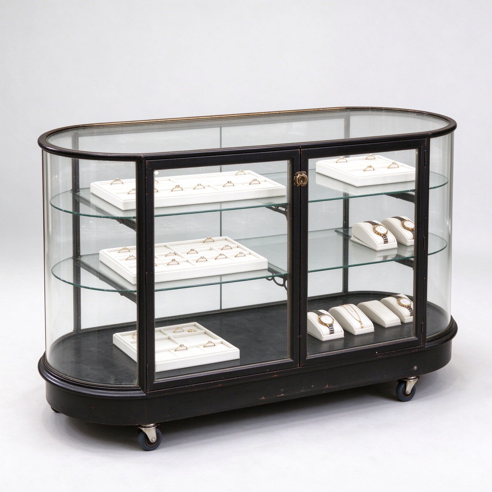 Portable oval glass display counter right 45 degree view