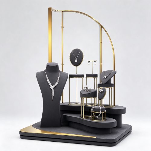 Jewelry shop window display props set with black matte stands, left 45 degree view
