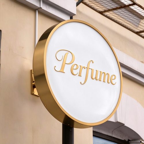 Round gold LED light box sign with Perfume text, left 45 degree angle view