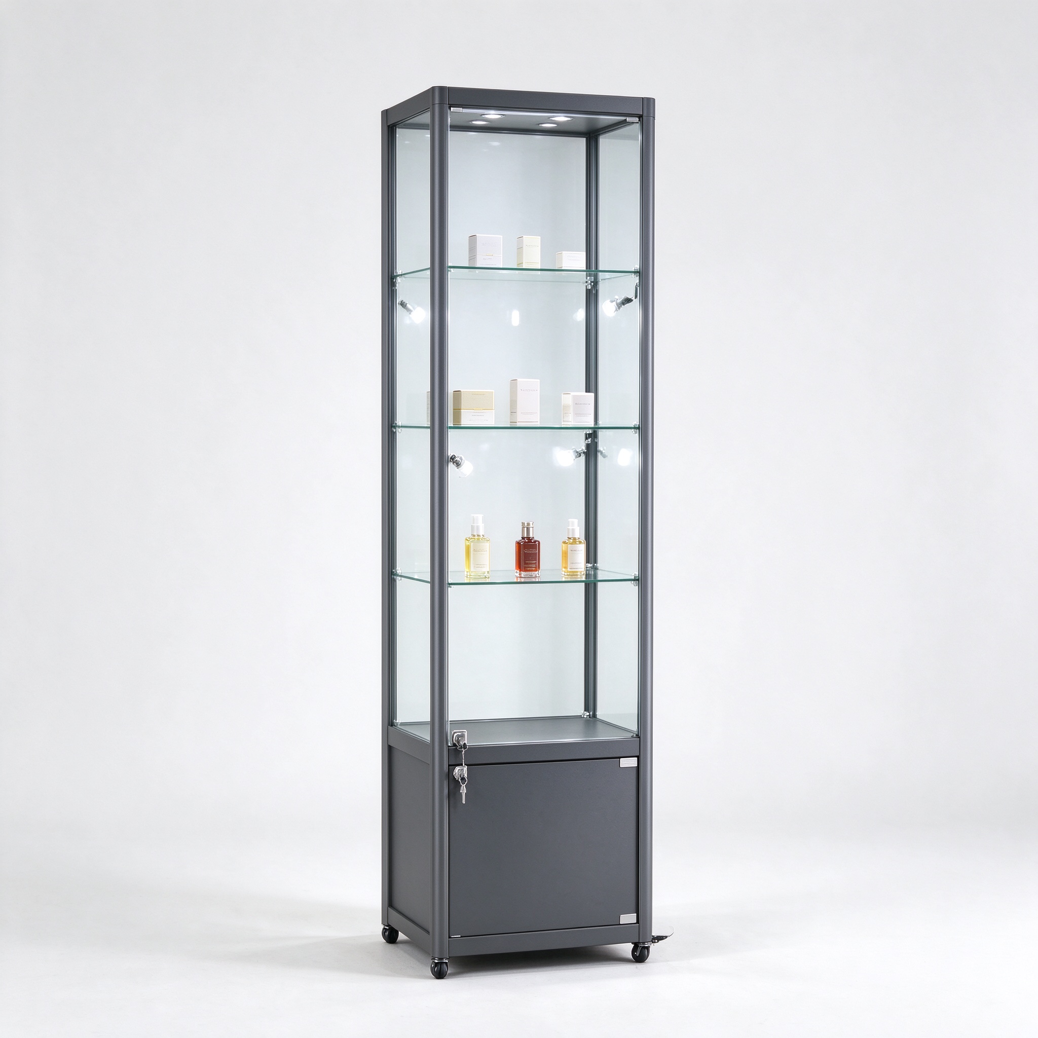 Dark gray narrow tower lockable glass display case left 45 view