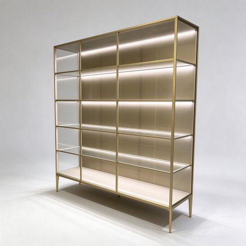 Champagne gold glass shelving unit left 45 view