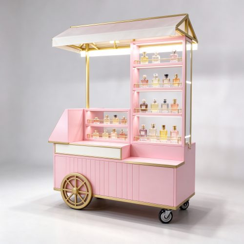 Pink perfume display cart with gold trim left 45 view