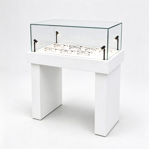 White glass optical display counter with spotlights left 45 view