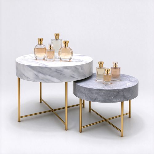 Set of 2 nesting marble perfume display tables right 45 degree view