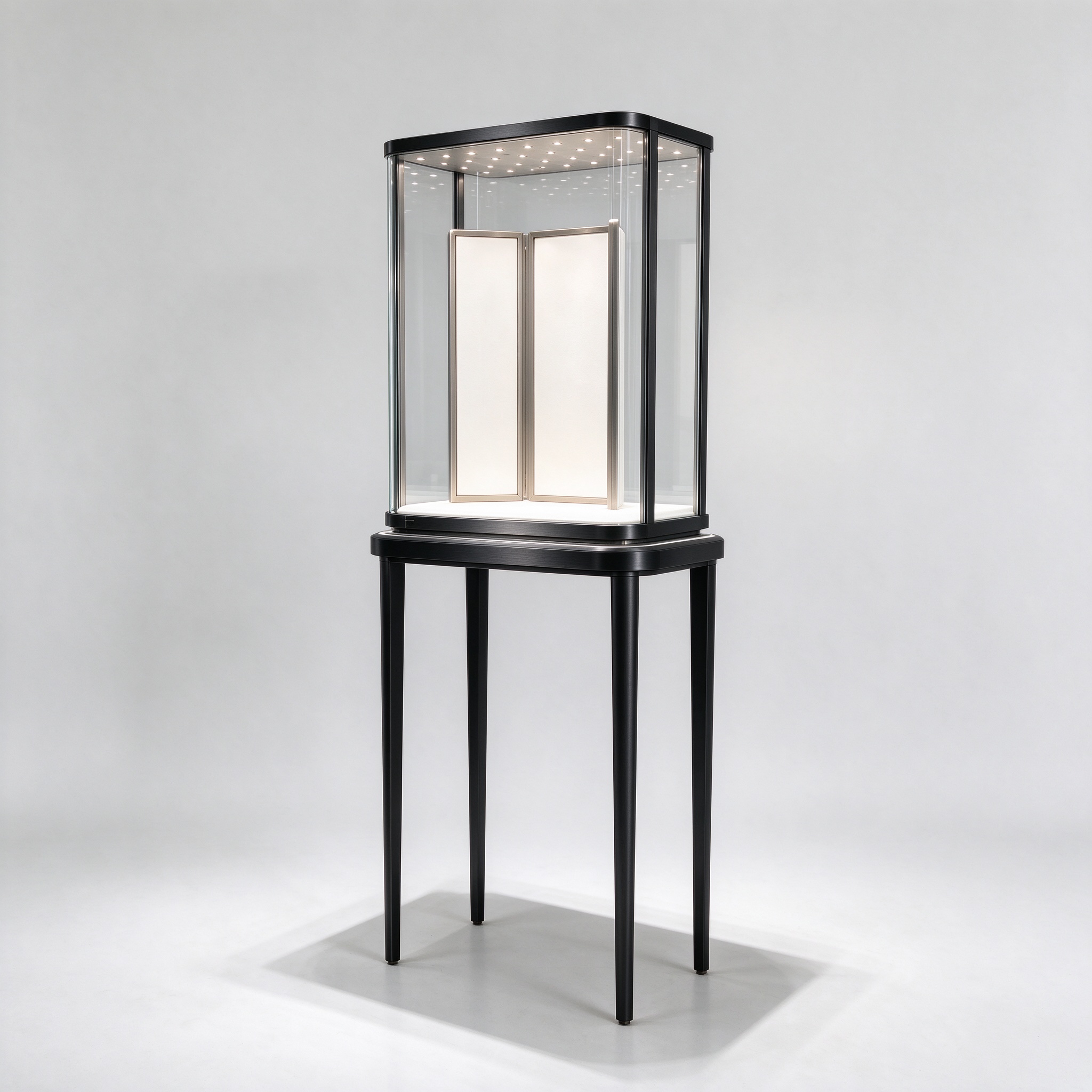 Illuminated black titanium tall-leg glass case left 45 degree view