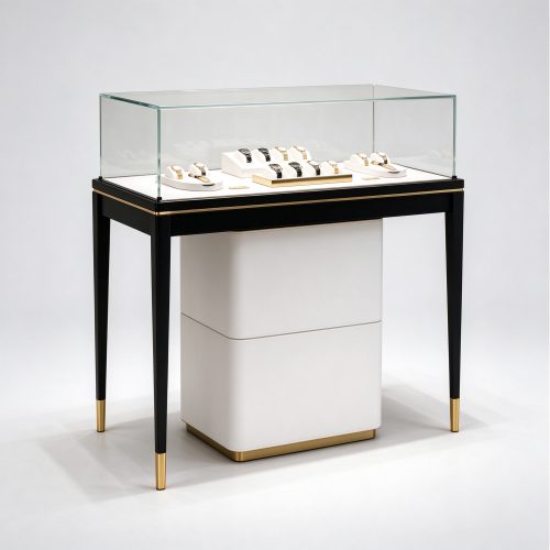 Black gold-tip watch table left 45 view