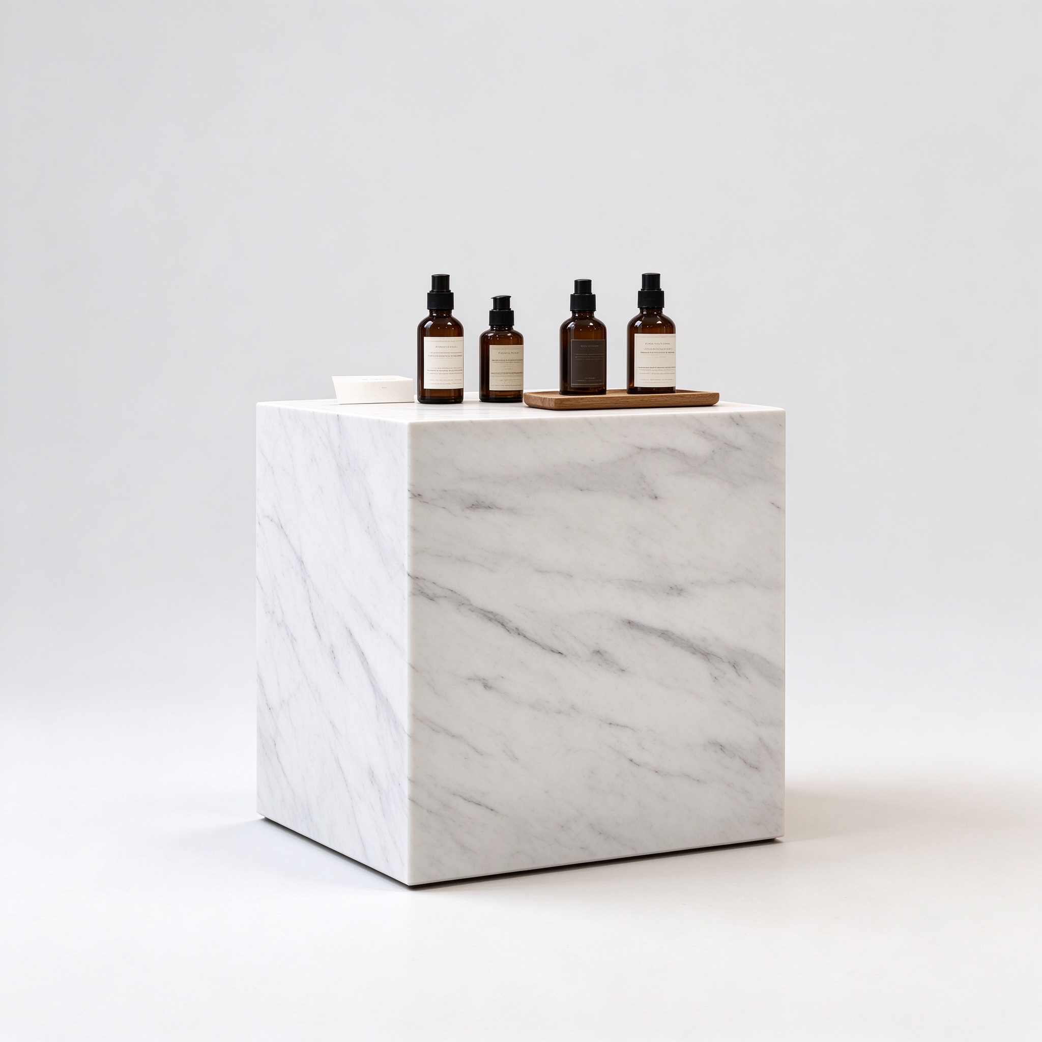 White Carrara marble cube perfume display pedestal left 45 degree view