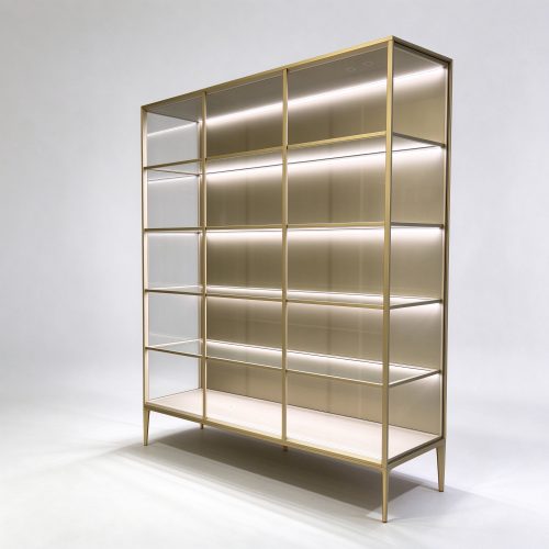 Champagne gold glass shelving unit right 45 view