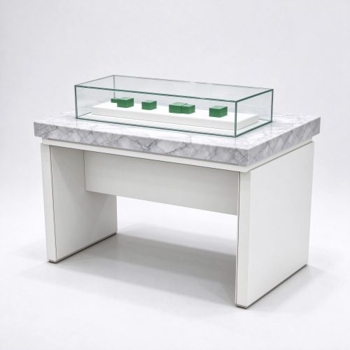 White and gray marble cannabis display table right 45 degree angle