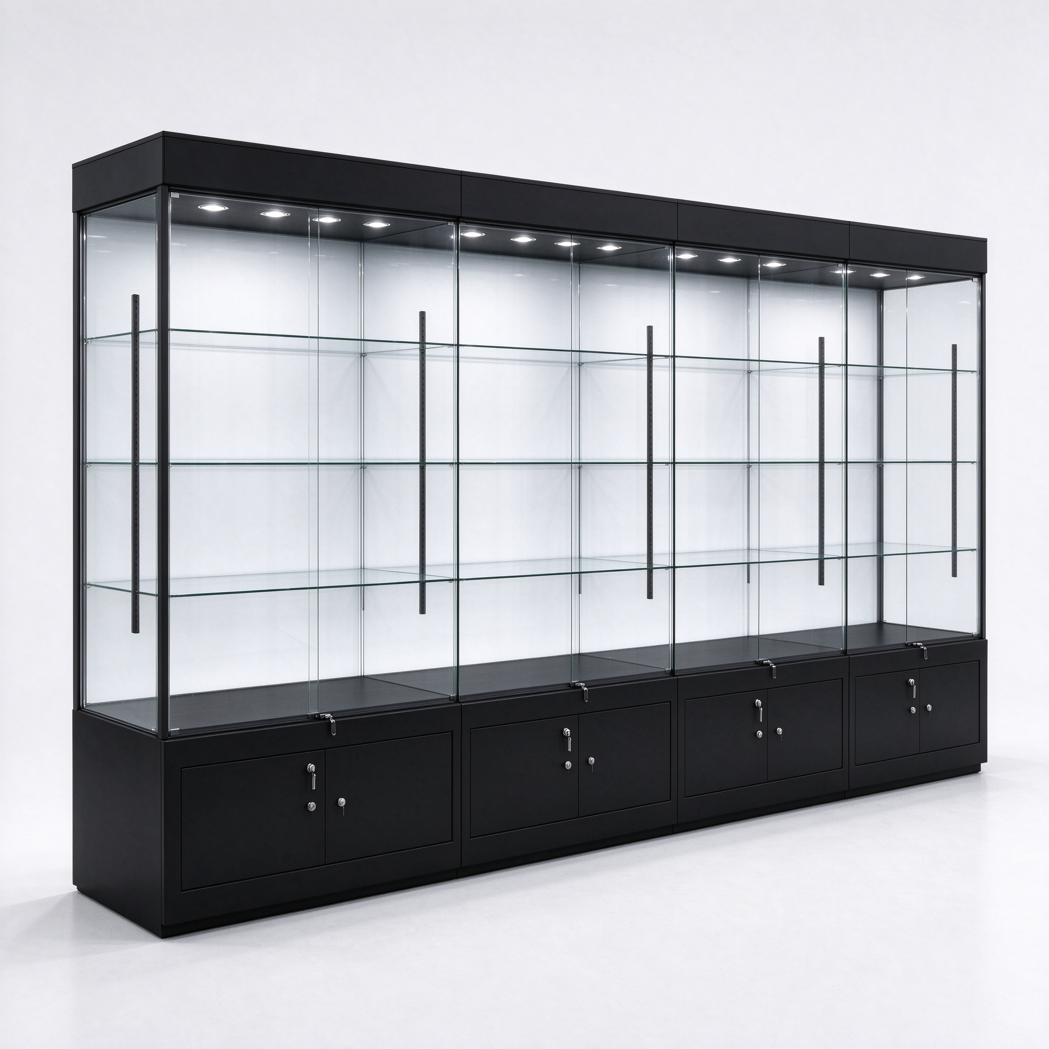 Long black metal frame trophy display cabinet with glass shelves, left 45 degree view