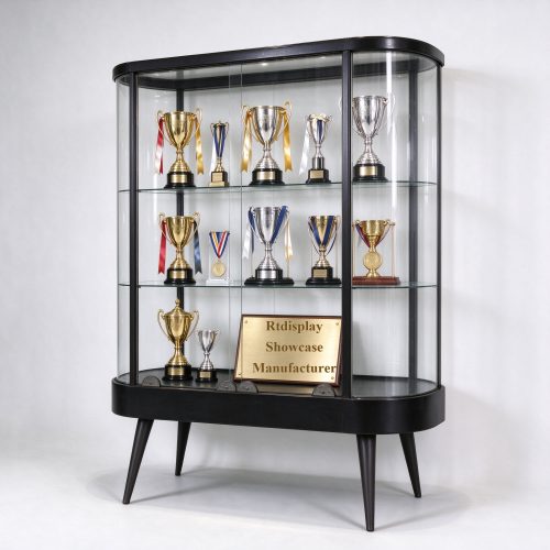 Office trophy display case with arched black frame and glass shelves, right 45 degree view