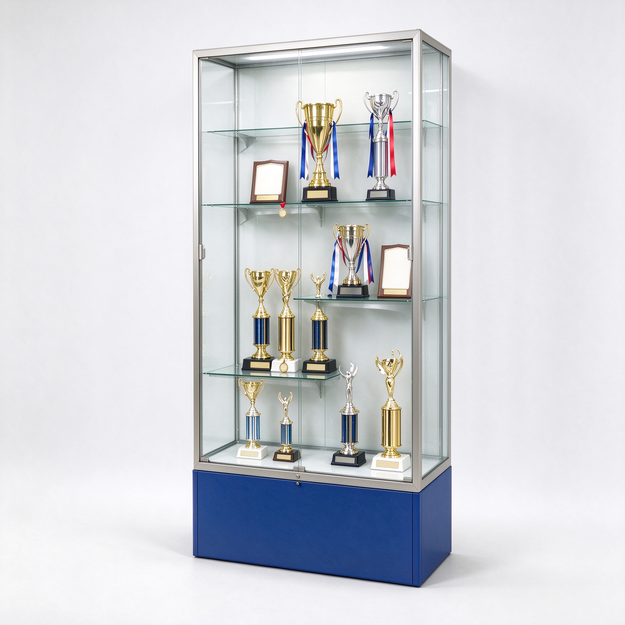 Blue trophy display cabinet for school with glass shelves and lockable base, left 45 degree view